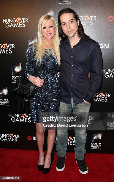 Actress Tara Reid and musician Erez Eisen attend the premiere of Sony Pictures Home Entertainment's "The Hungover Games" at the TCL Chinese 6...