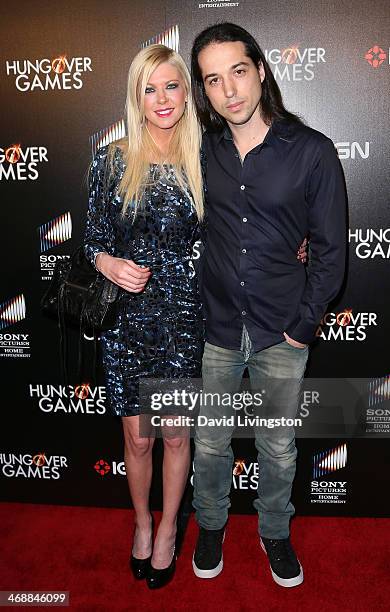 Actress Tara Reid and musician Erez Eisen attend the premiere of Sony Pictures Home Entertainment's "The Hungover Games" at the TCL Chinese 6...