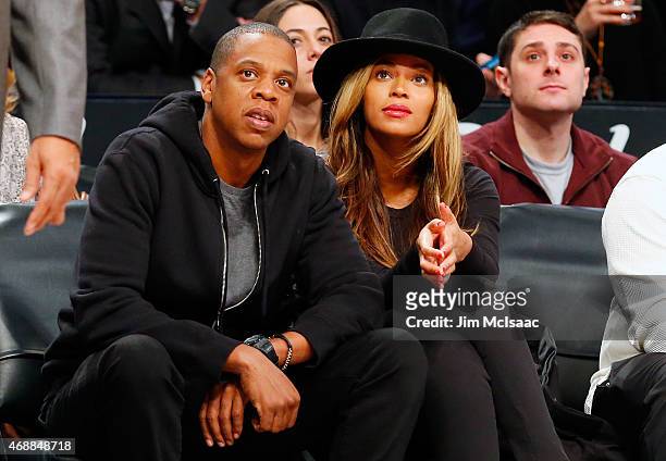 Musicians Jay-Z and Beyonce attend a game between the Brooklyn Nets and the Houston Rockets at Barclays Center on January 12, 2015 in the Brooklyn...