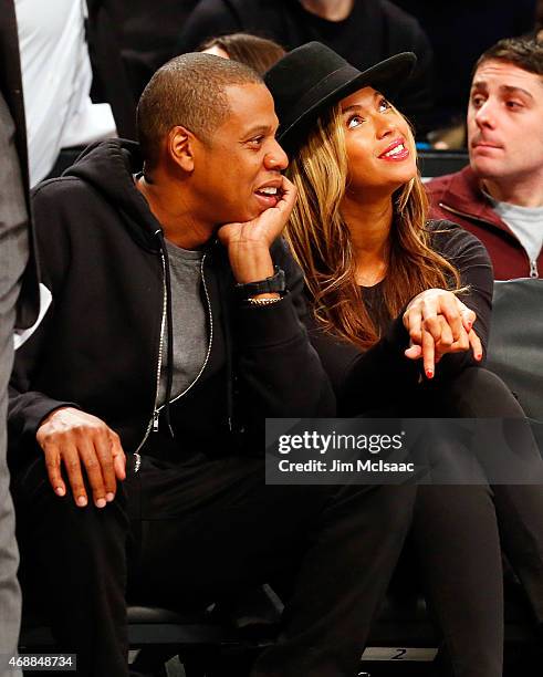 Musicians Jay-Z and Beyonce attend a game between the Brooklyn Nets and the Houston Rockets at Barclays Center on January 12, 2015 in the Brooklyn...