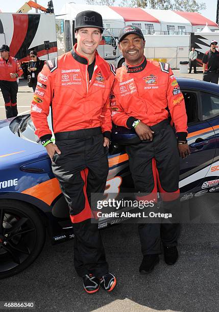 Actor James Maslow and drag racer Antron Brown participate in press day for Pro/Celebrity Race at Toyota Grand Prix of Long Beach on April 7, 2015 in...