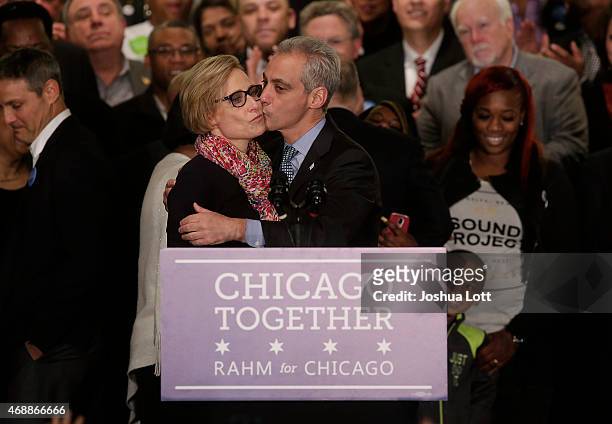 Rahm Emanuel receives a kiss from his wife Amy Rule after being re-elected Mayor of Chicago at his election night rally April 7, 2015 in Chicago,...