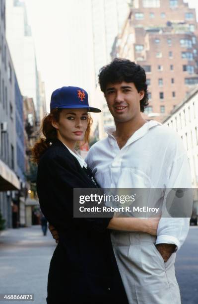 Portrait of American baseball player Ron Darling, a pitcher for the New York Mets, as he poses with his wife, model and actress Toni Darling , New...