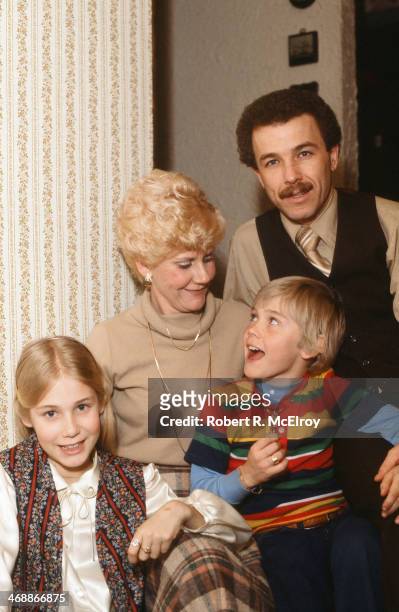 American child actor Ricky Schroder poses with his sister, fellow actor, Dawn Schroder , and their parents at his ninth birthday party, New York, New...