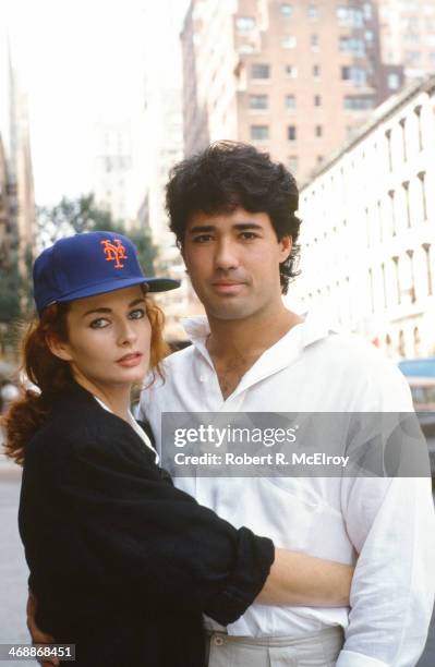 Portrait of American baseball player Ron Darling, a pitcher for the New York Mets, as he poses with his wife, model and actress Toni Darling , New...