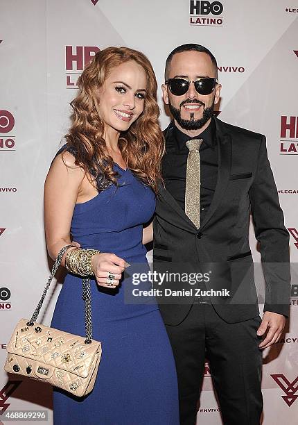 Musician Yandel with wife Edneris Espada Figueroa attend the HBO Latino red carpet premiere of the 'Camino Al Concierto and Legacy: De Lider a...