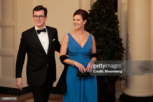 Actor and television host Stephen Colbert, left, and his wife Evelyn "Evie" Colbert arrive at a state dinner hosted by U.S. President Barack Obama...