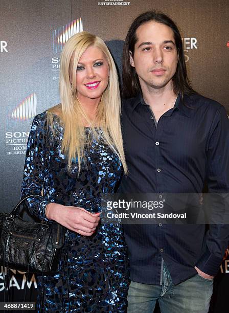 Actress Tara Reid and Erez Eisen attend the Los Angeles Premiere of "The Hungover Games" at TCL Chinese Theatre on February 11, 2014 in Hollywood,...