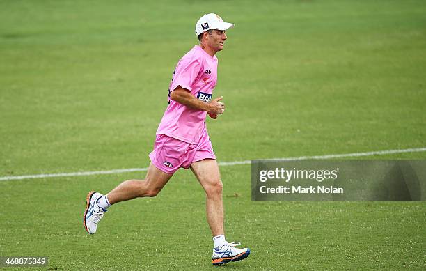 Simon Katich runs the field during the Greater Western Sydney Giants AFL intra-club match at Blacktown International Sportspark on February 12, 2014...