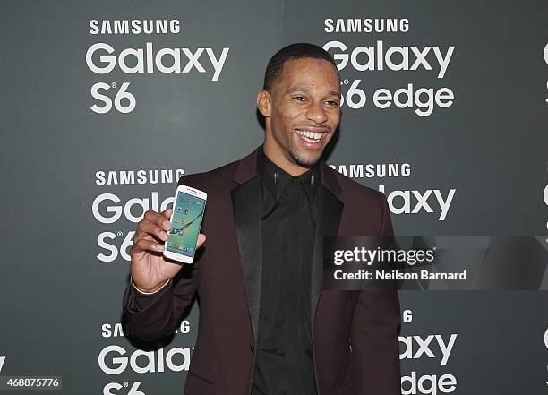 Victor Cruz arrives on the red carpet at the Samsung Galaxy S 6 edge launch in New York City on April 7, 2015 in New York City.