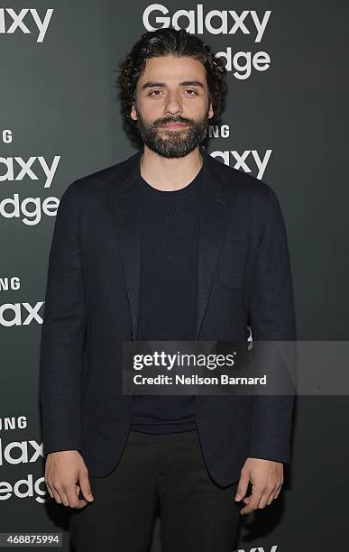 Oscar Isaac arrives on the red carpet at the Samsung Galaxy S 6 edge launch in New York City on April 7, 2015 in New York City.