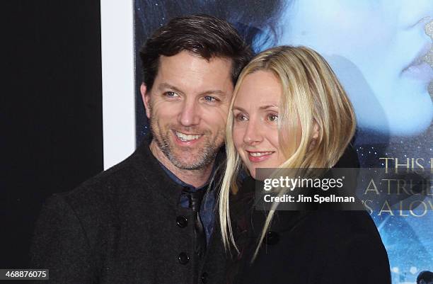 Actors Jon Patrick Walker and Hope Davis attend the "Winter's Tale" world premiere at Ziegfeld Theater on February 11, 2014 in New York City.