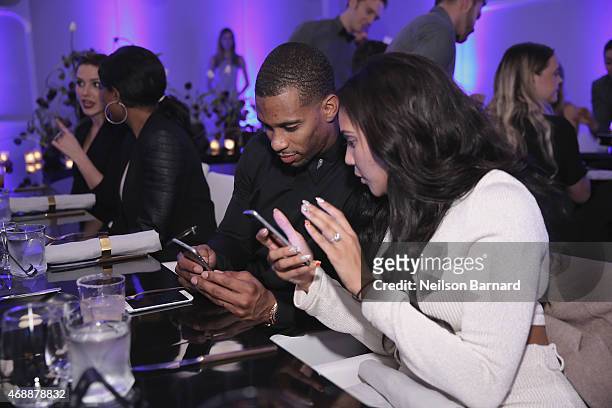 Victor Cruz and Elaina Watley attend the Samsung Galaxy S 6 edge launch in New York City on April 7, 2015 in New York City.