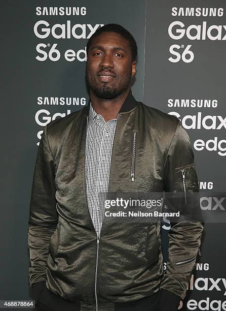 Roy Hibbertarrives on the red carpet at the Samsung Galaxy S 6 edge launch in New York City on April 7, 2015 in New York City.