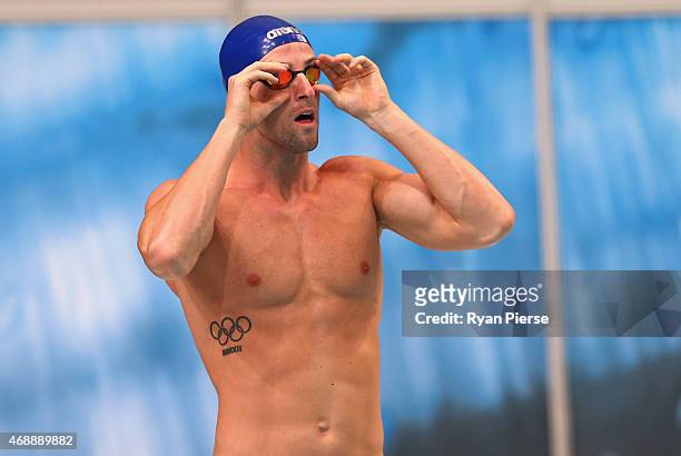James Magnussen of Australia prepares for the Men's 50m Freestyle Semi Final during day six of the Australian National Swimming Championships at...