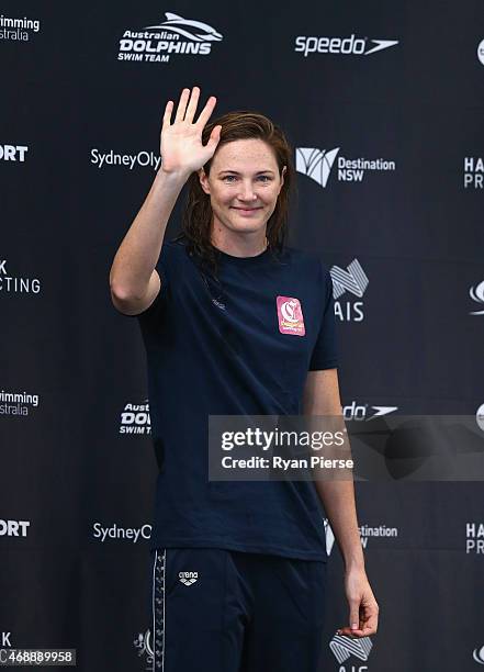 Cate Campbell of Australia celebrates on the podium after winning the Womens 100m Freestyle Final during day six of the Australian National Swimming...