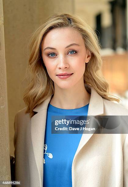 Sarah Gadon who plays Princess Elizabeth in 'A Royal Night Out' visits the Chelsea Pensioners to hear first hand their experiences of V.E Day in 1945...