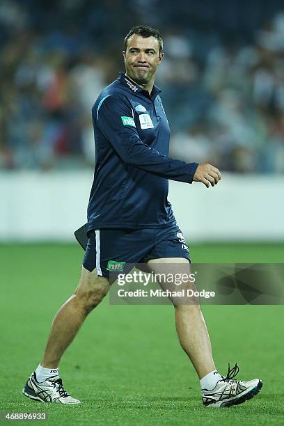 Cats coach Chris Scott reacts during the round one AFL NAB Cup match between the Geelong Cats and the Collingwood Magpies at Simonds Stadium on...