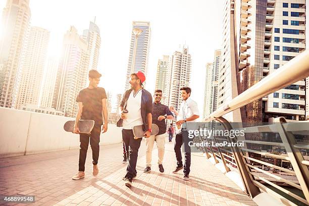 friends enjoying dubai city life - dubai marina stock pictures, royalty-free photos & images