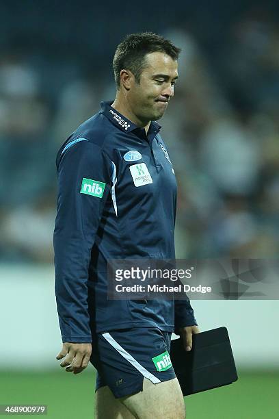 Cats coach Chris Scott reacts during the round one AFL NAB Cup match between the Geelong Cats and the Collingwood Magpies at Simonds Stadium on...