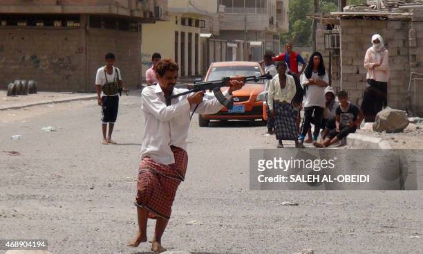 Yemeni supporters of the southern seperatist movement fire towards Huthi rebels during clashes in the northern Dar Saad neighbourhood of the southern...