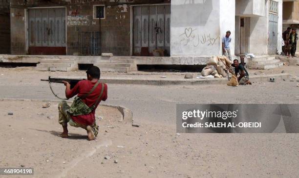 Yemeni supporters of the southern seperatist movement fire towards Huthi rebels during clashes in the northern Dar Saad neighbourhood of the southern...