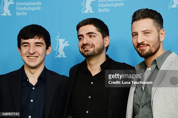 Actor Alechan Tagaev, director Umut Dag and actor Murathan Muslu attend the 'Cracks in Concrete' photocall during 64th Berlinale International Film...