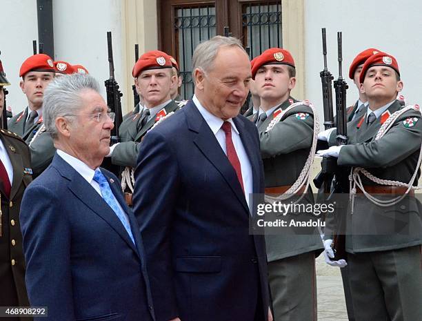 Austrian President Heinz Fischer welcomes Latvian President Andris Berzins with an official ceremony in Vienna, Austria on April 8, 2015.