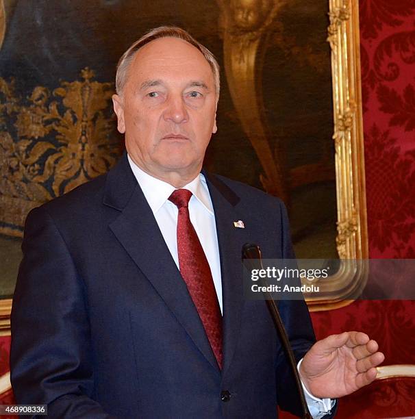 Latvian President Andris Berzins is seen as he meets Austrian President Heinz Fischer during his official visit in Vienna, Austria on April 8, 2015.