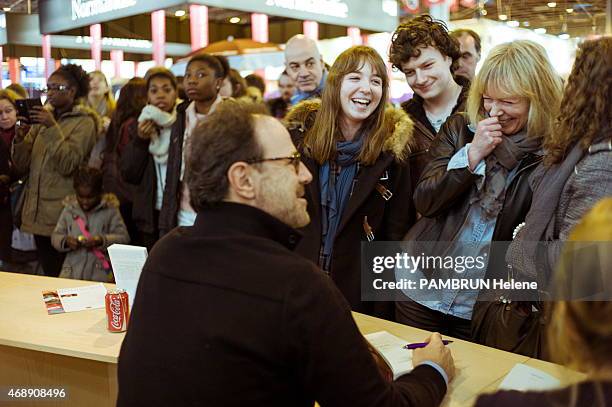 French writer Marc Levy at the 35th Salon du Livre in Paris, on march 21, 2015.