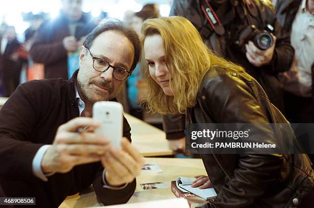 French writer Marc Levy at the 35th Salon du Livre in Paris, on march 21, 2015.