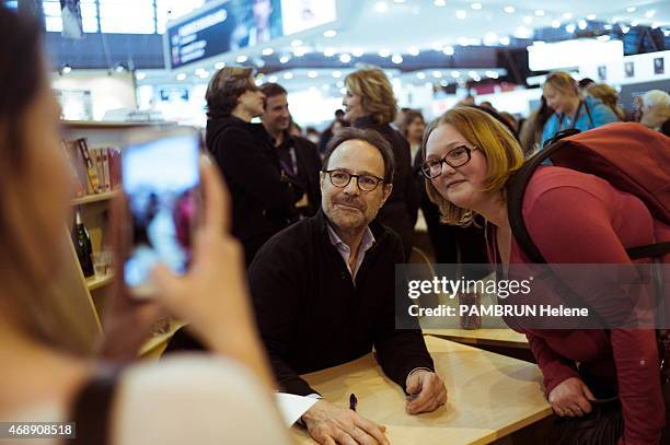 French writer Marc Levy at the 35th Salon du Livre in Paris, on march 21, 2015.