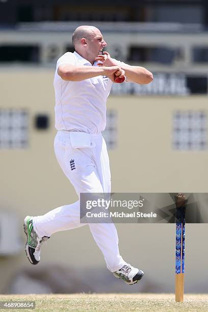 James Tredwell of England bowls during day one of the 2nd Invitational Warm Up match between St Kitts and Nevis and England at Warner Park on April...