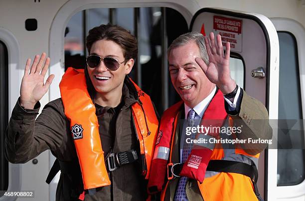 United Kingdom Independence Party leader Nigel Farage and reality tv star Joey Essex on board the Grimsby pilot boat during campaigning on April 8,...