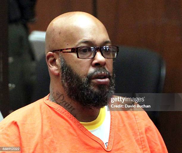 Marion 'Suge' Knight appears in court with his Lawyer Matthew P Fletcher for a preliminary hearing in a robbery charge case at Criminal Courts...