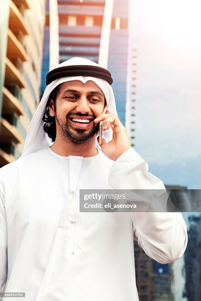 Arab business on the phone in Dubai.