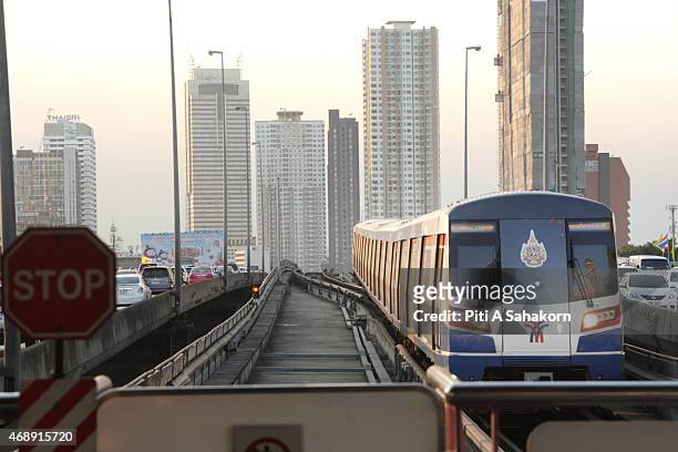 The BTS sky train drives along a railway track in Bangkok.