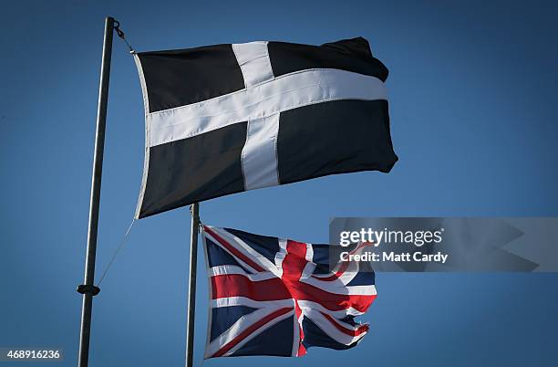 Cornish flag flutters besides a Union flag at Geevor Tin Mine near St Ives on April 8, 2015 in Cornwall, England. Prime Minister David Cameron has...