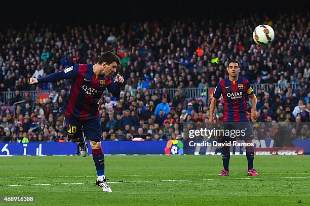 Lionel Messi of FC Barcelona heads the ball towards goal during the La Liga match between FC Barcelona and UD Almeria at Camp Nou on April 8, 2015 in...