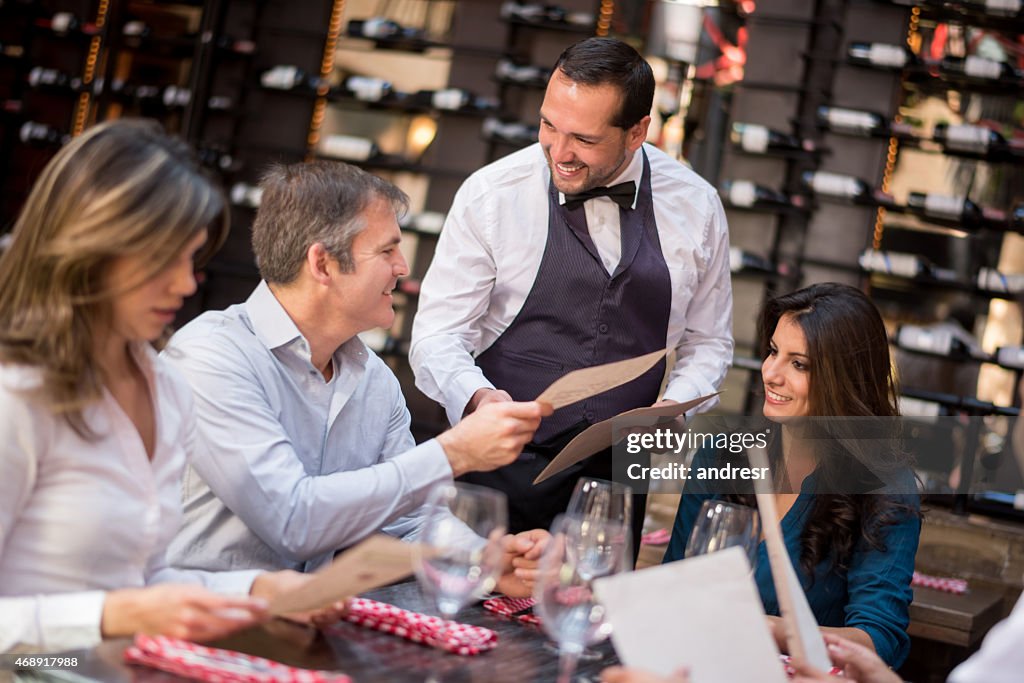 Friends having dinner at a restaurant