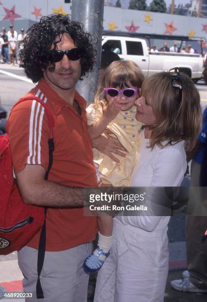 Actress Rosanna Arquette, husband John Sidel and daughter Zoe Sidel attend the "Hercules" Hollywood Premiere on June 22, 1997 at the El Capitan...