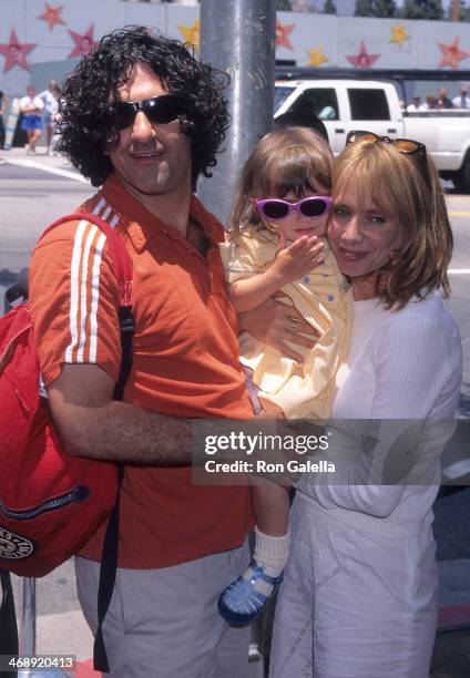 Actress Rosanna Arquette, husband John Sidel and daughter Zoe Sidel attend the "Hercules" Hollywood Premiere on June 22, 1997 at the El Capitan...