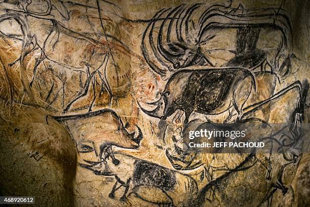 Detail of the full-scale reproduction of frescos found at the cave of Pont-D'Arc also known as the Chauvet cave, on April 8, 2015 in Vallon Pont...