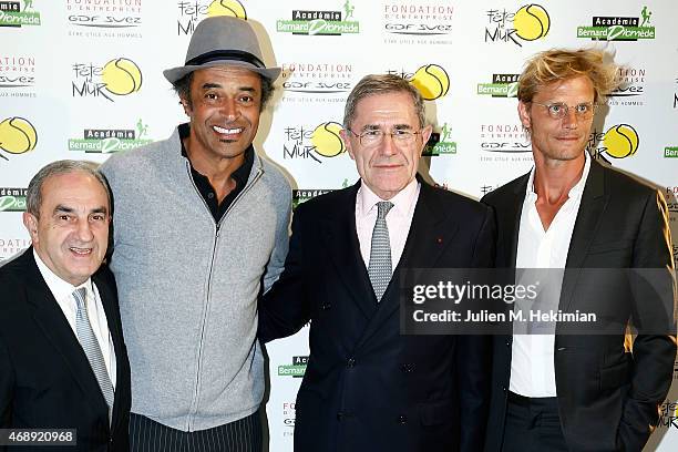 President of Federation Francaise de Tennis Jean Gachassin, Yannick Noah, President of GDF-SUEZ Gerard Mestrallet and Arnaud Lemaire attend the...