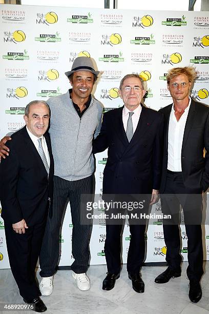 President of Federation Francaise de Tennis Jean Gachassin, Yannick Noah, President of GDF-SUEZ Gerard Mestrallet and Arnaud Lemaire attend the...