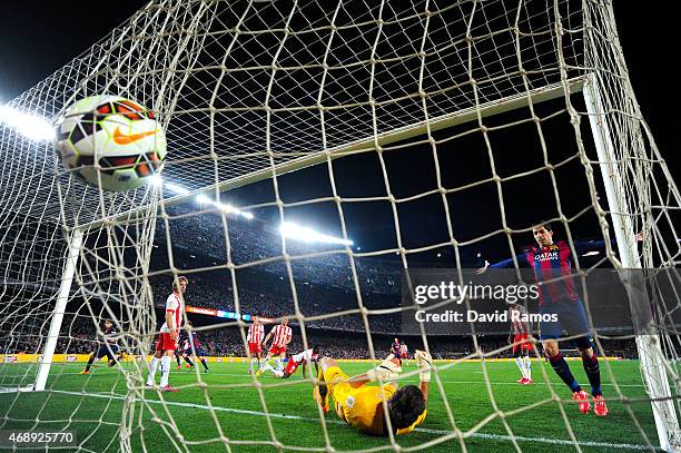 Marc Bartra of FC Barcelona scores his team's third goal during the La Liga match between FC Barcelona and UD Almeria at Camp Nou on April 8, 2015 in...