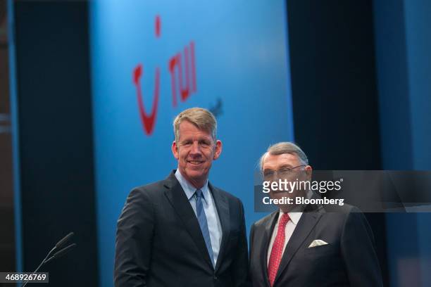 Friedrich Joussen, chief executive officer of TUI AG, left, and Klaus Mangold, chairman of TUI AG, pose for a photograph before the company announce...