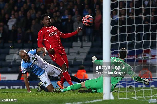 Daniel Sturridge of Liverpool misses a chance under pressure from Alex John-Baptiste and Simon Eastwood of Blackburn Rovers during the FA Cup Quarter...