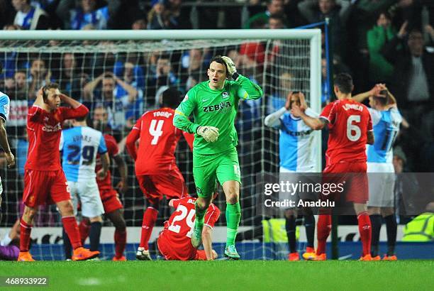 Blackburn Rovers goalkeeper Simon Eastwood has his shot blocked in a last deperate last minute effort to score against Liverpool during the FA Cup...