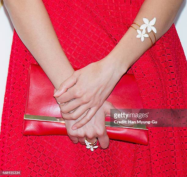 South Korean model Han Hye-Jin, bag detail, attends the photocall for CH 'Carolina Herrera' launch on April 8, 2015 in Seoul, South Korea.